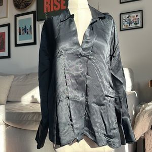 Black satin blouse. V-neck button style. Worn once. Fits more like XL.